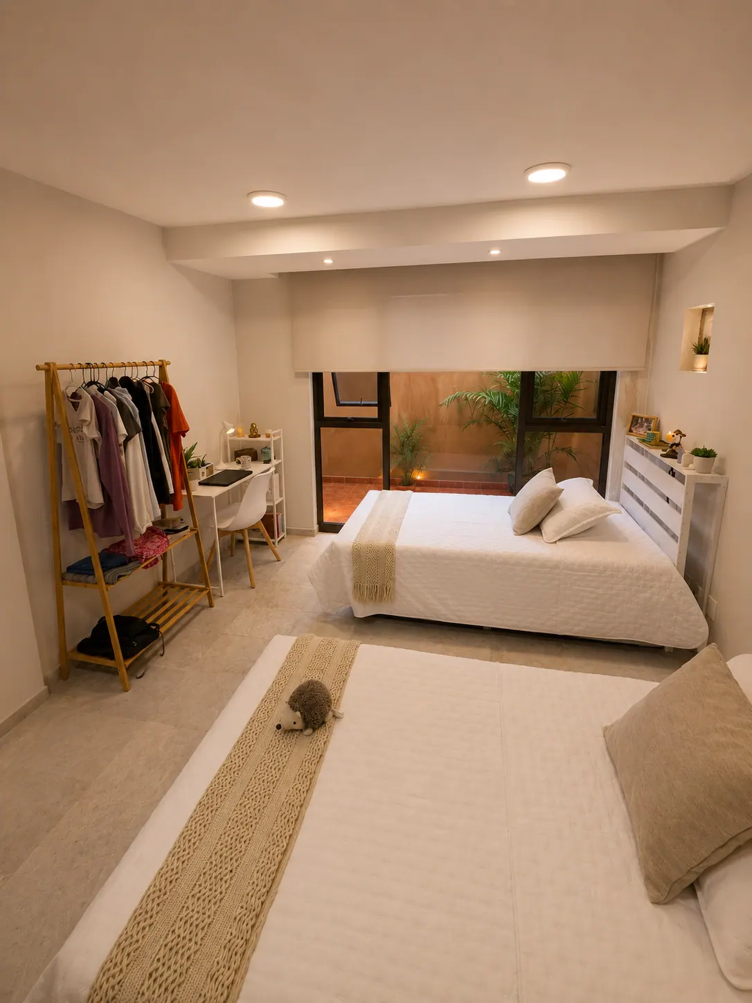 Essential Shared Room 2 — bed B, courtyard view